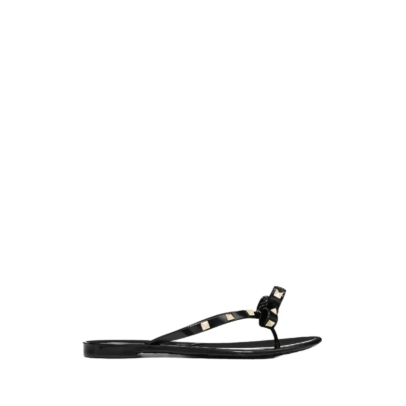 Comfortable sandals for women with cross-over straps and padded footbed for support-Valentino Garavani Rubber Rockstud Thong Sandals