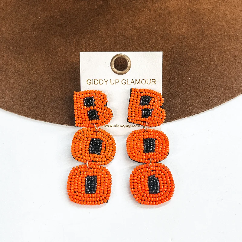 Hoop earrings with hammered copper for a warm and rustic aesthetic-BOO Seedbeaded Earrings in Orange