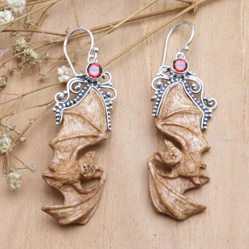 Hoop earrings with crescent moon shapes for a celestial and mystical appearance-Novica Handmade Brown Bats Garnet And Bone Dangle Earrings