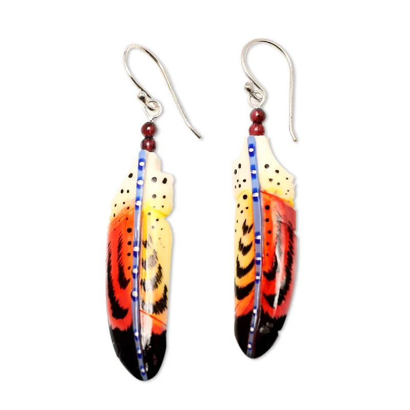 Best hoop earrings with gold for a luxurious and timeless look-Novica Handmade Courage Feathers Garnet Beaded Dangle Earrings