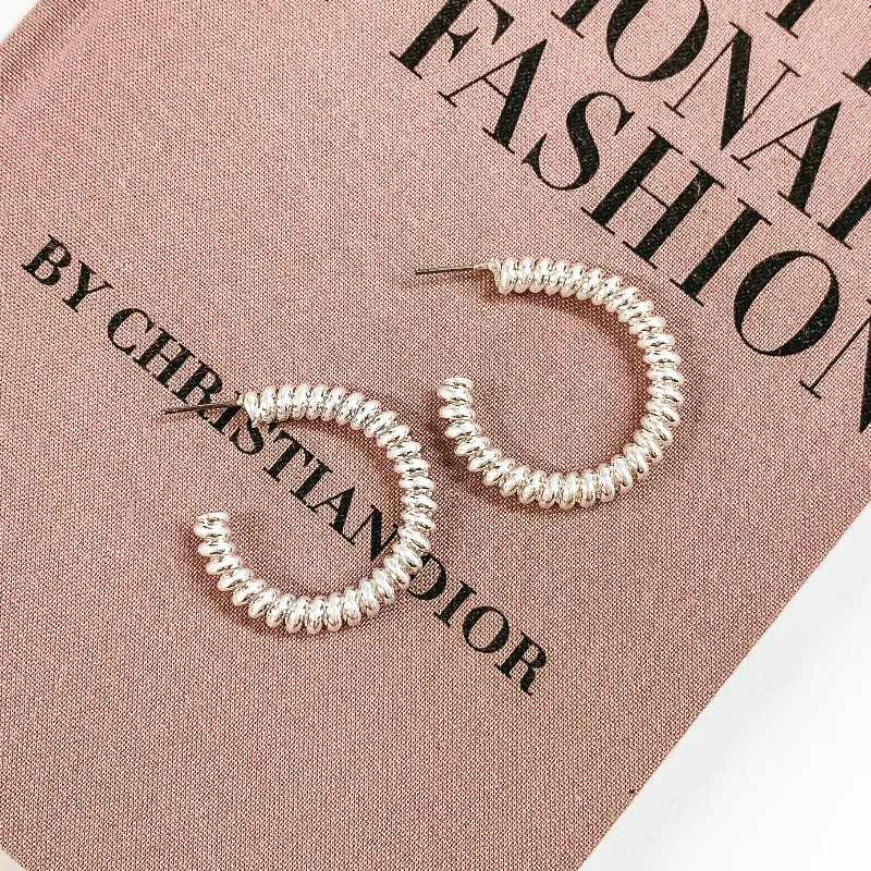 Classic hoop earrings with a thin profile for a sleek and subtle style-Spiral Hoop Earrings in Silver Tone