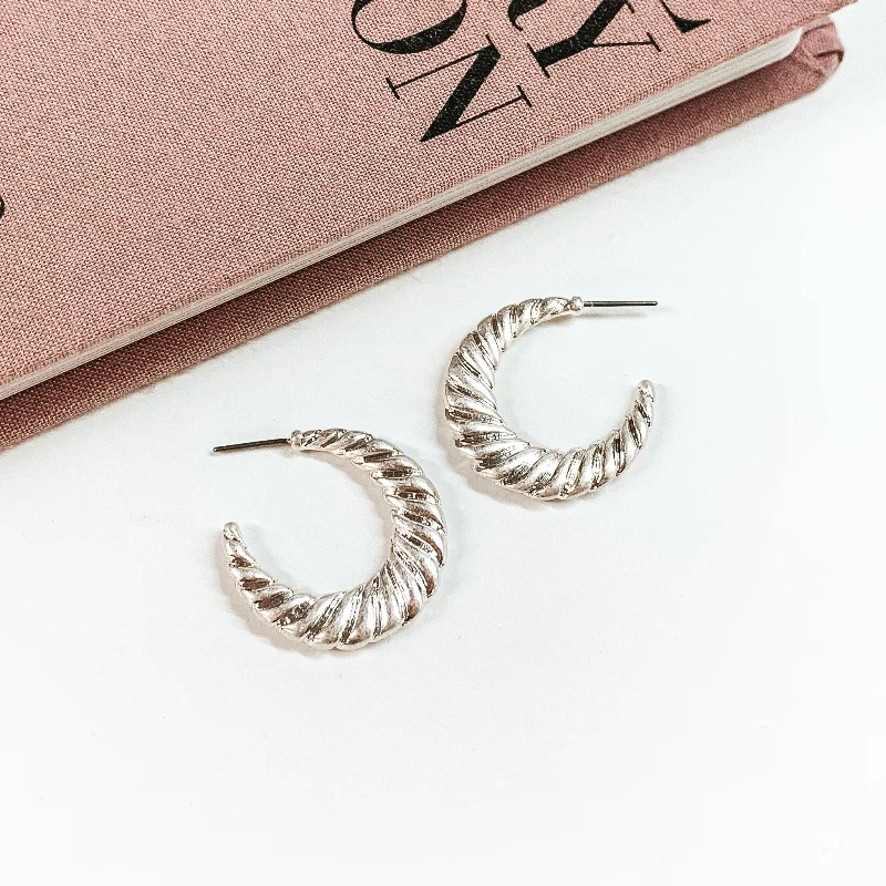 Hoop earrings with a chunky design for a bold and trendy statement-Twist of Fate Twisted Hoop Earrings in Silver Tone